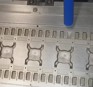 Dry ice cleaning removing wax and gas buildup from semiconductor molds